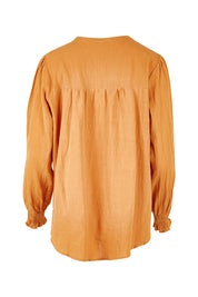 Product shot of the Jessica Cotton Blouse in colour Rust, from the back