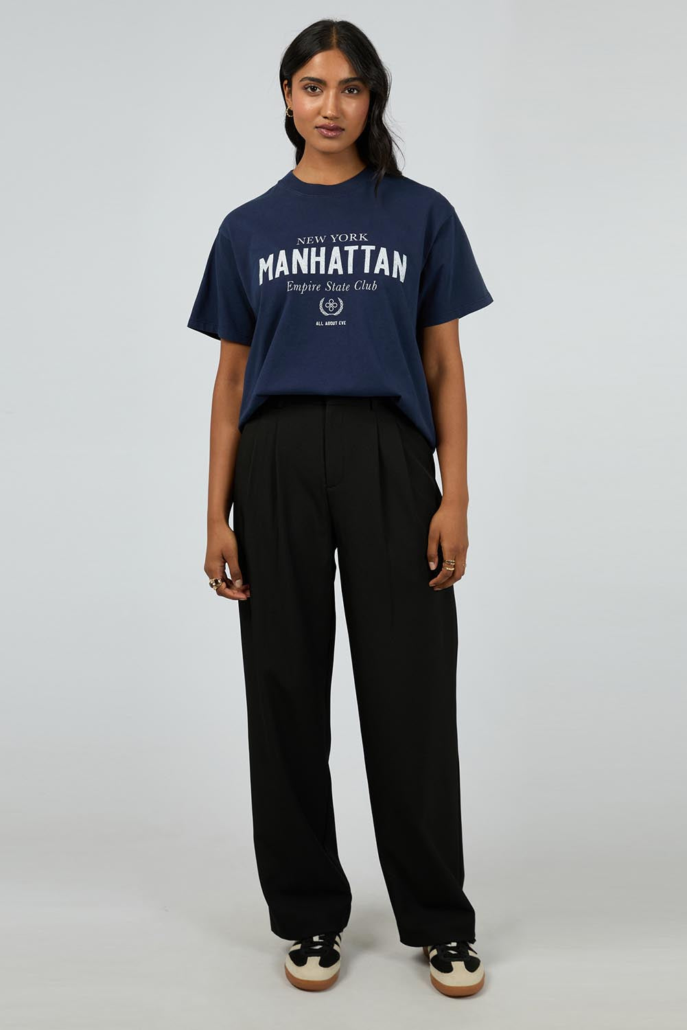 A model wearing the Manhattan Oversized Cotton Tee in colour Navy (Blue), from the front, showing the whole outfit