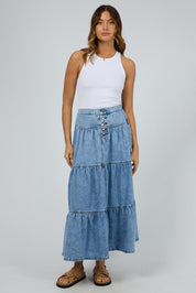 A model wearing the Coco Denim Maxi Skirt in colour Lightblue (Blue), from the front, showing the whole outfit