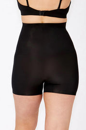 A model wearing the Powerlite High Waisted Short in colour Black, from the back