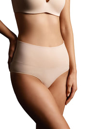 A model wearing the Seamless Smoothies Full Brief 2 Pack in colour Rosebeige, from the front, cropped image