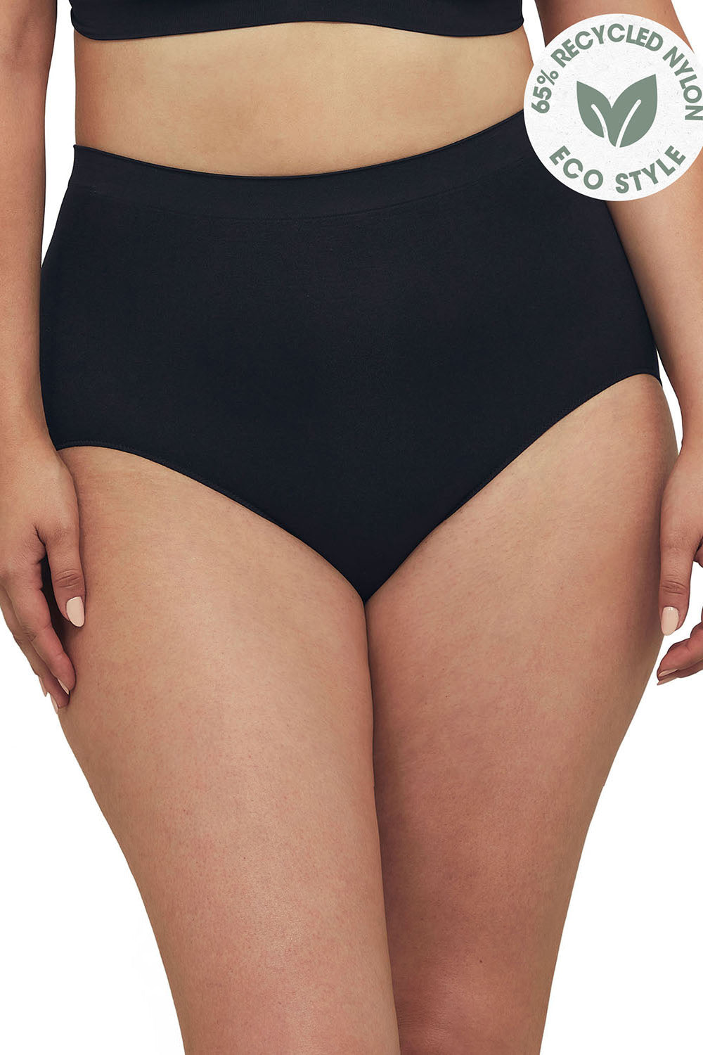 A model wearing the Bare Essentials Full Brief in colour Black (Black), from the front, cropped image