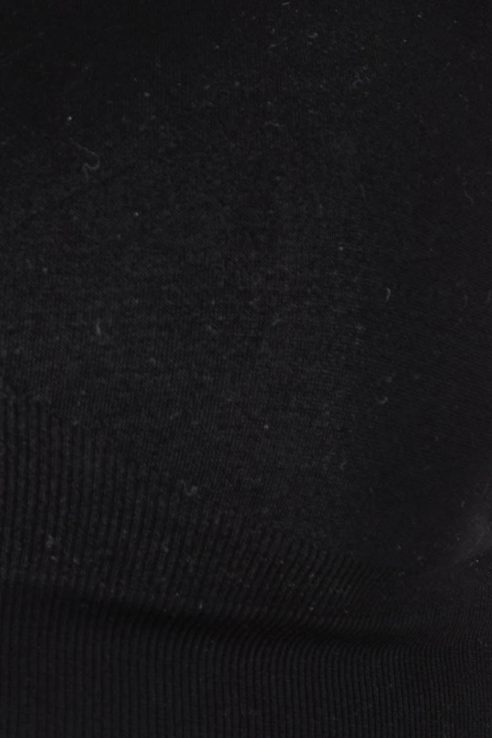 Product shot of the Bare Essentials Support Wirefree Bra in colour Black, detail