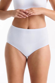 A model wearing the Pure Basics Modal Full Briefs 2 Pack in colour Aurablue (Blue), from the front, cropped image