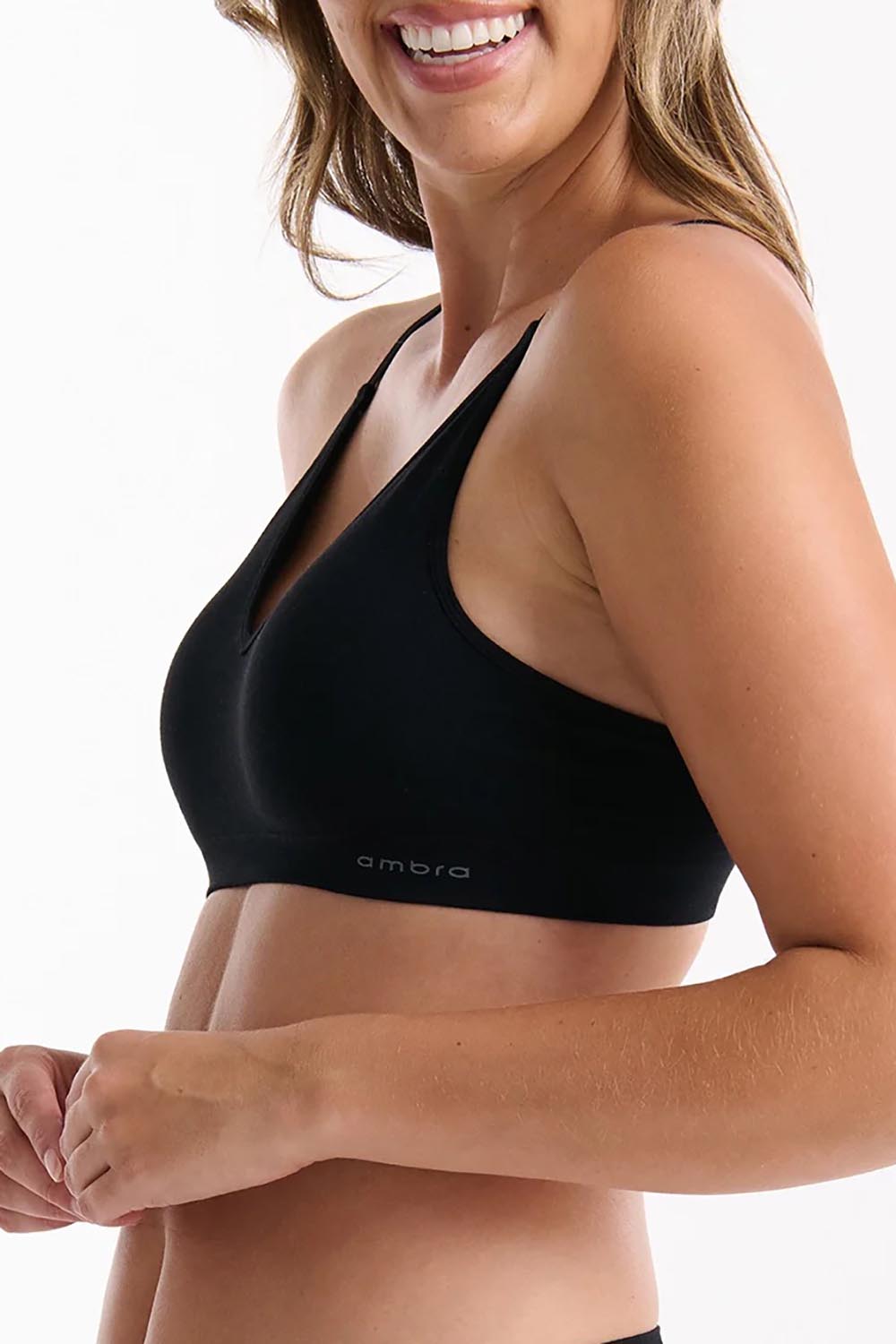A model wearing the Pure Basics Triangle Modal Bralette in colour Black (Black)