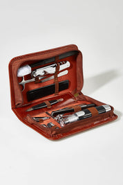 A model wearing size OneSize of the Gentleman's  Allin colourIn-One Grooming Kit - Cognac, from the front, showing the whole outfit