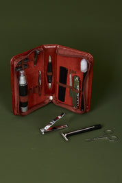 A model wearing size OneSize of the Gentleman's  Allin colourIn-One Grooming Kit - Cognac, from the front, showing the whole outfit