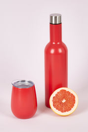 A model wearing the Matte Wine Bottle in colour Watermelon (Red), from the front, showing the whole outfit