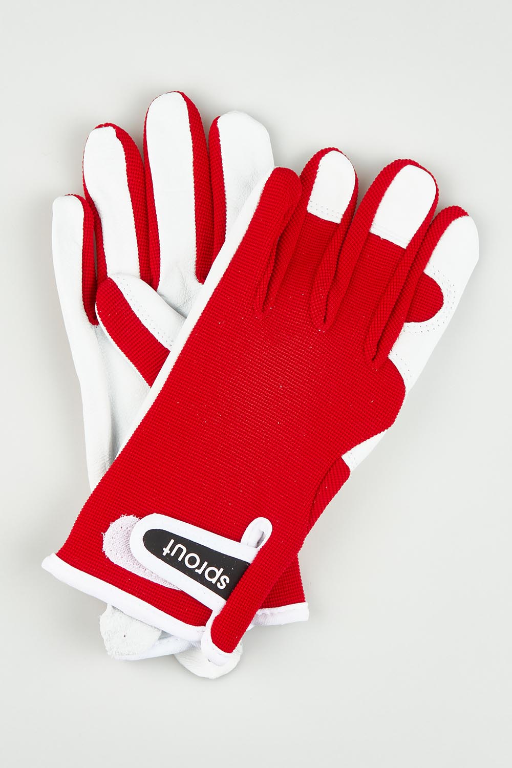 A model wearing the Sprout Goatskin Gloves in colour Red (Red), from the front, showing the whole outfit