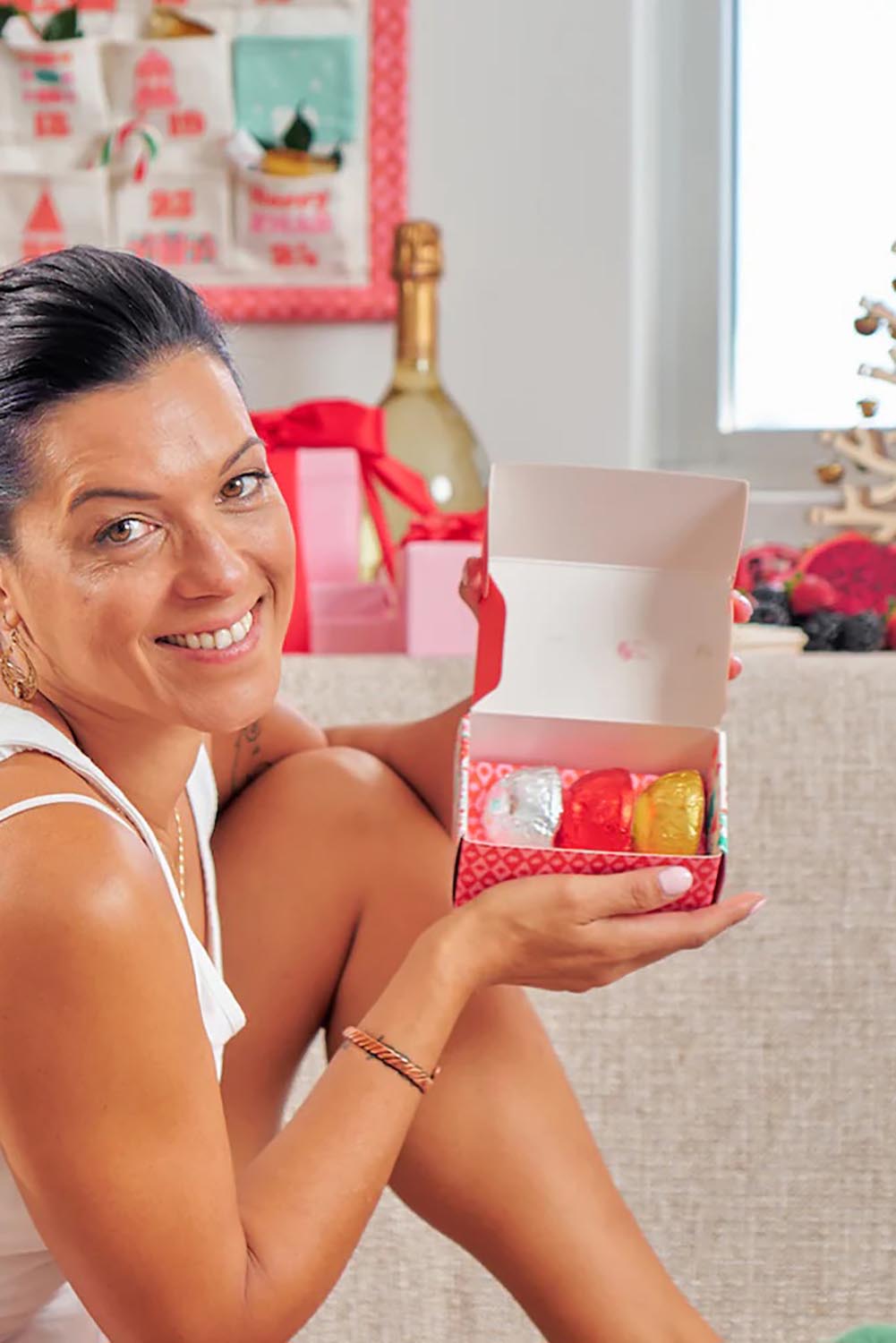 A model wearing the Christmas Shower Steamers in colour Christmas, from the front, showing the whole outfit