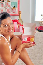 A model wearing the Christmas Shower Steamers in colour Christmas, from the front, showing the whole outfit