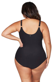 A model wearing the Delacroix One Piece in colour Black (Black), from the front, cropped image