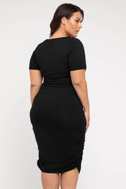 A model wearing the Jasper Ruched Dress in colour Black (Black), from the back