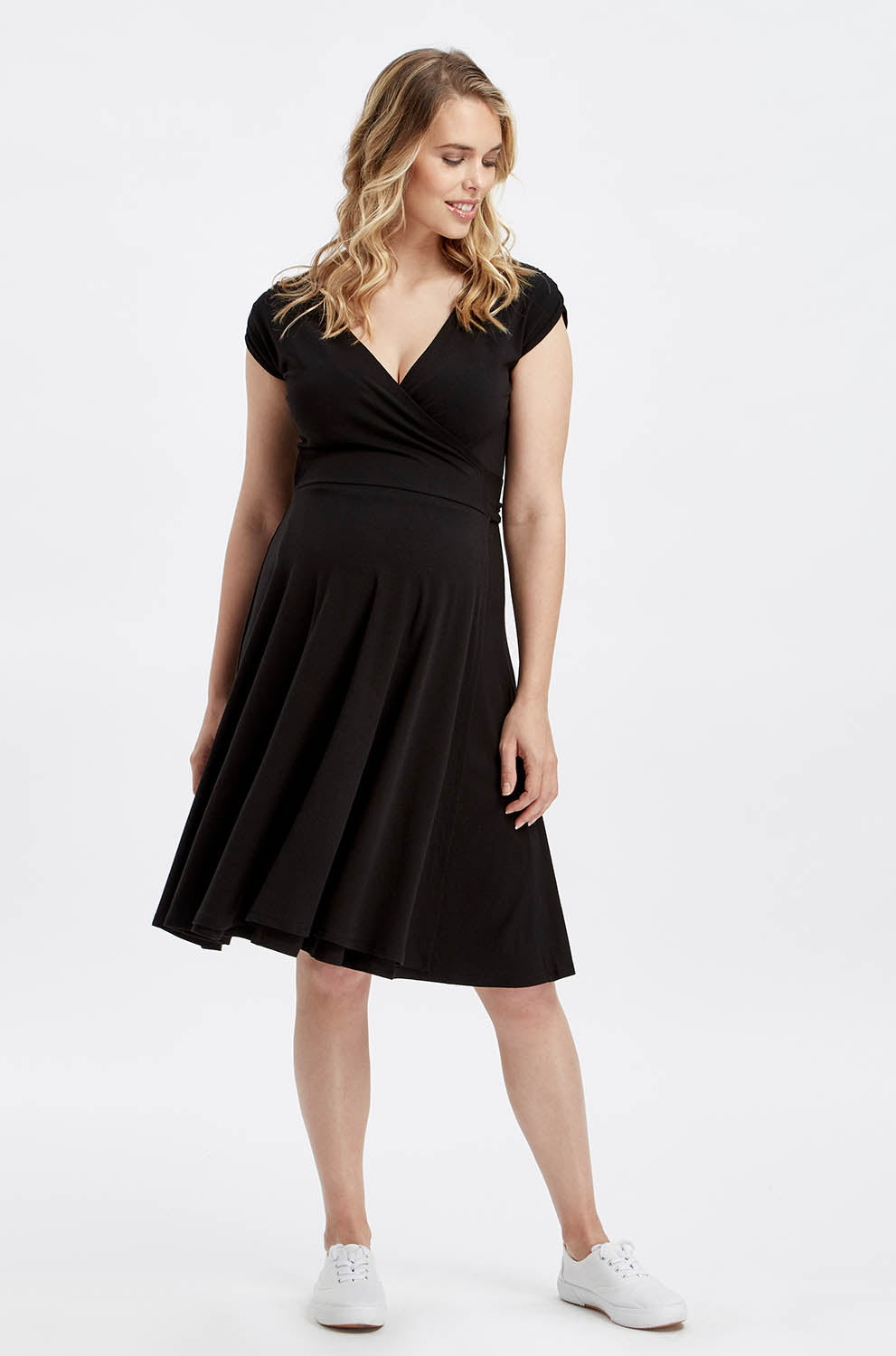 A model wearing the Wrap Dress in colour Black (Black), from the front, showing the whole outfit