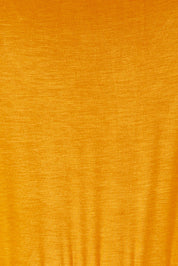 Product shot of the Mila Maxi Dress in colour Tumeric, detail