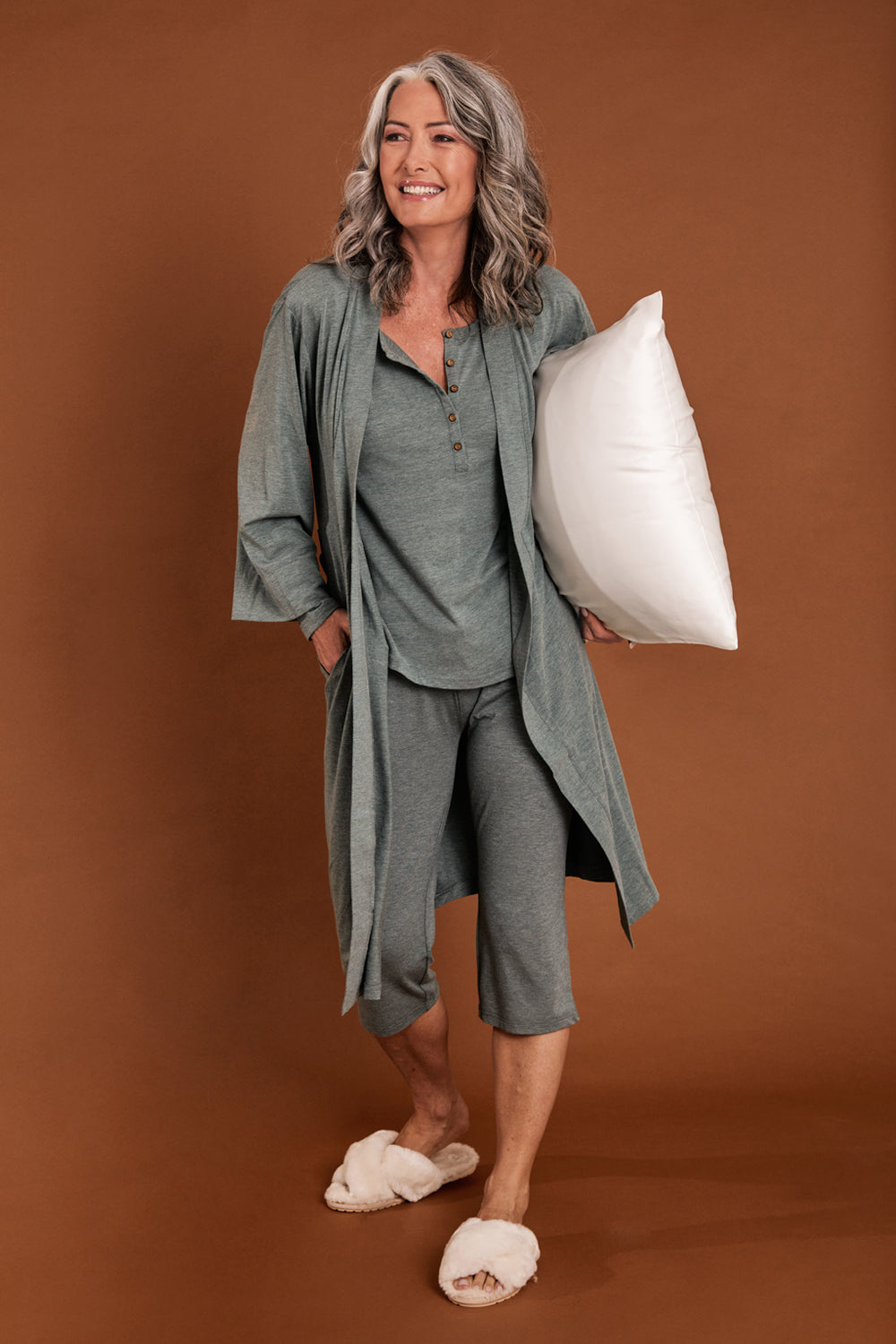 Model Luisa wearing size S of the Bamboo Robe in colour Moss (Green), from the front, showing the whole outfit