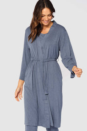 A model wearing the Bamboo Robe in colour Twilight (Blue), from the front, cropped image