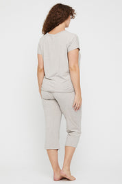 A model wearing the Lounge Bamboo Tee in colour Oatmeal, from the back