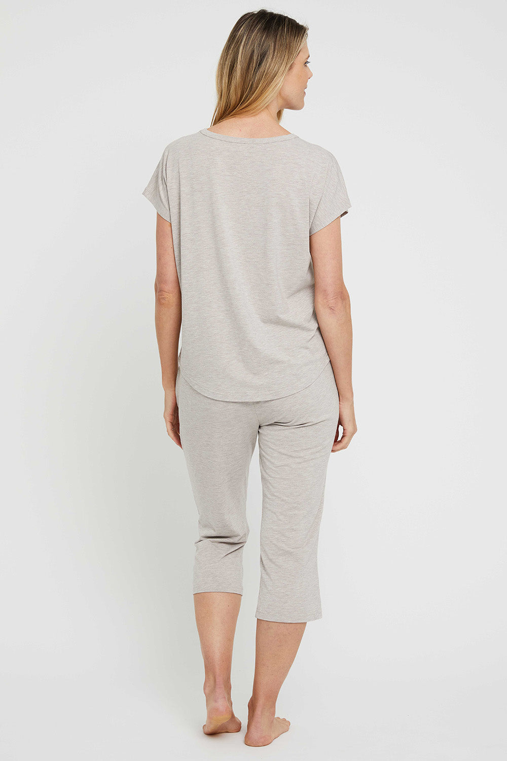 A model wearing the Lounge Bamboo Tee in colour Oatmeal, from the back