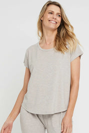A model wearing the Lounge Bamboo Tee in colour Oatmeal, from the front, cropped image