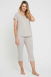 A model wearing the Lounge Bamboo Tee in colour Oatmeal, from the front, showing the whole outfit
