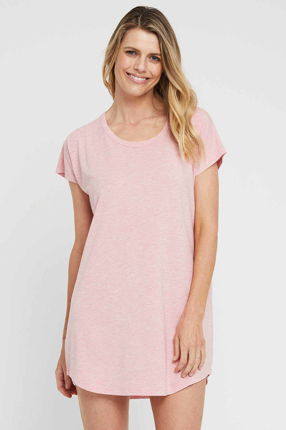 A model wearing the Bamboo Nightie in colour Rose (Pink), from the front, cropped image