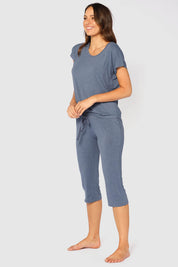 A model wearing the 3/4 Bamboo PJ Pant in colour Twilight (Blue), from the front, showing the whole outfit