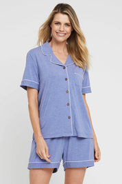 A model wearing the Bamboo PJ Set in colour Lavender (Blue), from the front, cropped image