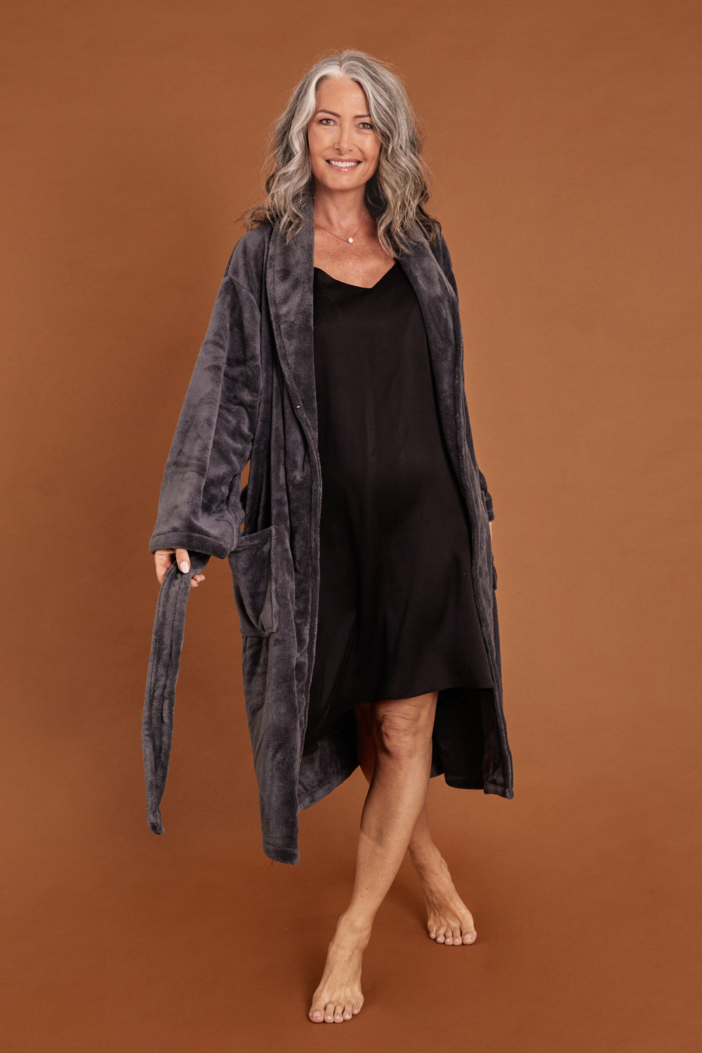 Model Luisa wearing the Microplush Bath Robe in colour Charcoal (Grey), from the front, showing the whole outfit
