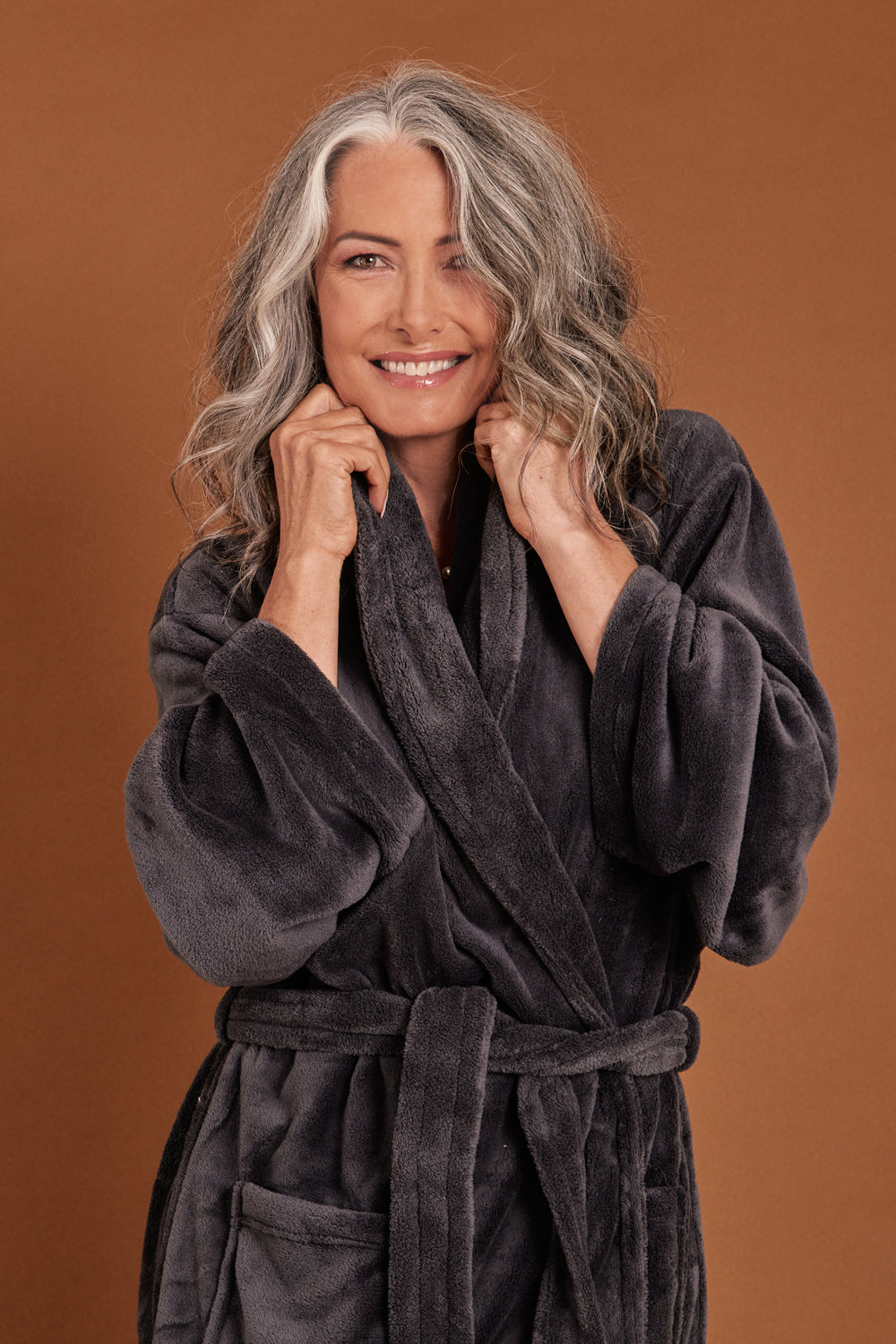 Model Luisa wearing the Microplush Bath Robe in colour Charcoal (Grey), from the front, showing the whole outfit