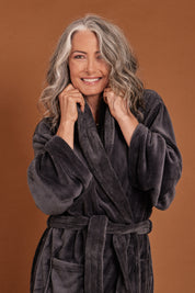 Model Luisa wearing the Microplush Bath Robe in colour Charcoal (Grey), from the front, showing the whole outfit