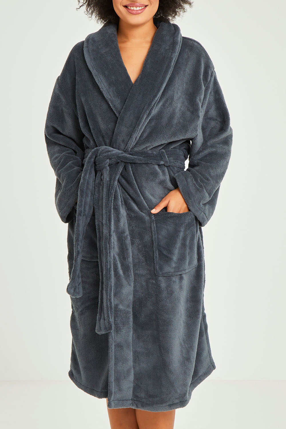 Model Olivia wearing the Microplush Bath Robe in colour Charcoal (Grey), from the front, cropped image
