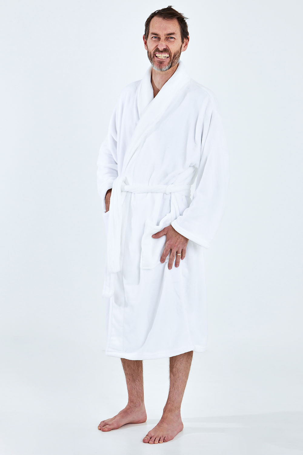 A model wearing the Microplush Bath Robe in colour White (White), from the front, showing the whole outfit