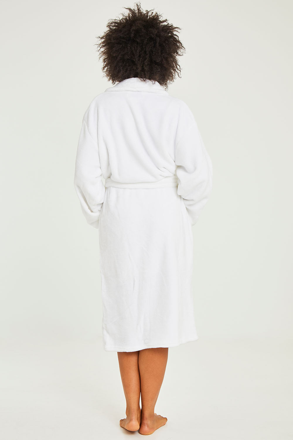Model Olivia wearing the Microplush Bath Robe in colour White (White), from the back
