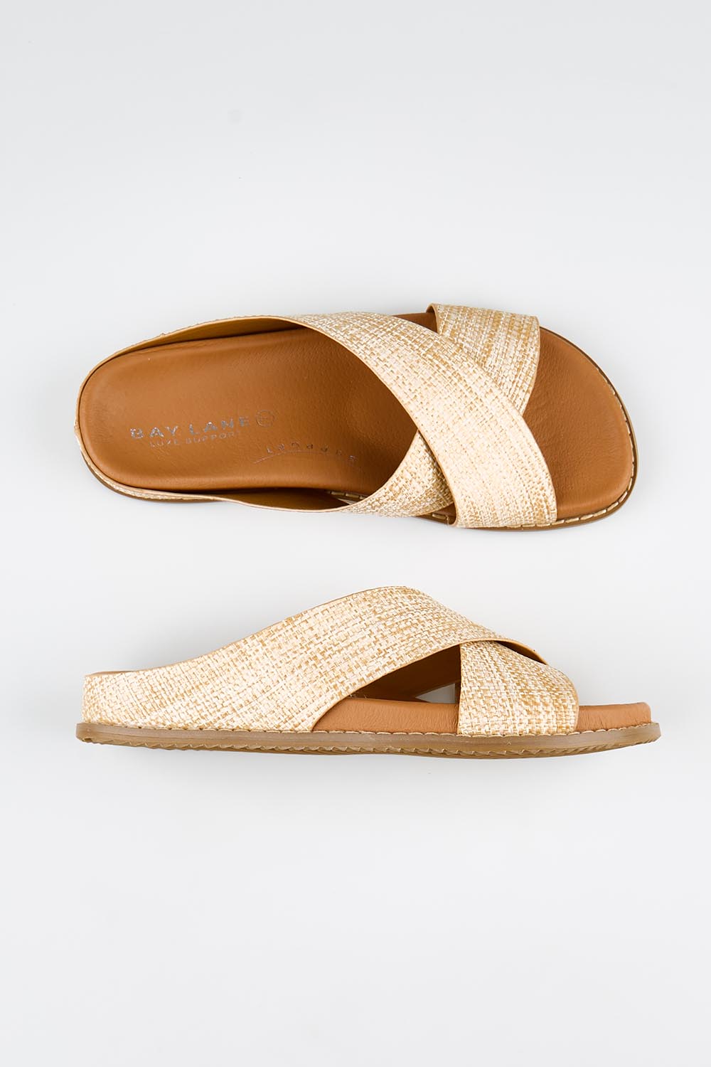 Model Genericm wearing size sample of the Mystic Leather Slide - Naturalraffia in colour Naturalraffia, from an angle