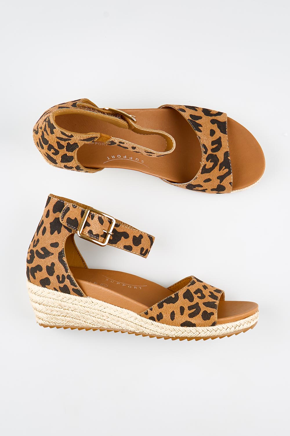 Model Genericm wearing size sample of the Olivia Espadrille Heel - Leopard in colour Leopard, from an angle