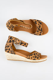 Model Genericm wearing size sample of the Olivia Espadrille Heel - Leopard in colour Leopard, from an angle