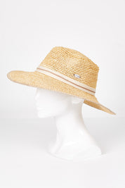 A model wearing size OneSize of the Asta Wide Brim Fedora in colour Natural, from the front, showing the whole outfit