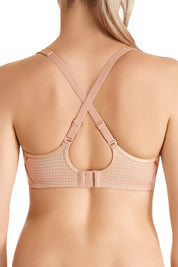 A model wearing the Electrify Mesh Underwire Bra in colour SoftPowder, from the back