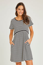 Model Elhana wearing size 10 of the Milla Tin colourShirt Dress - Blkstripe (Black), from the front, cropped image