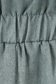 Product shot of the Baker Short in colour Deepgrn (Green), detail
