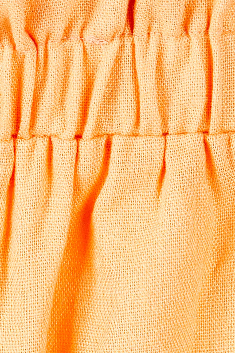 Product shot of the Baker Short in colour Mango, detail