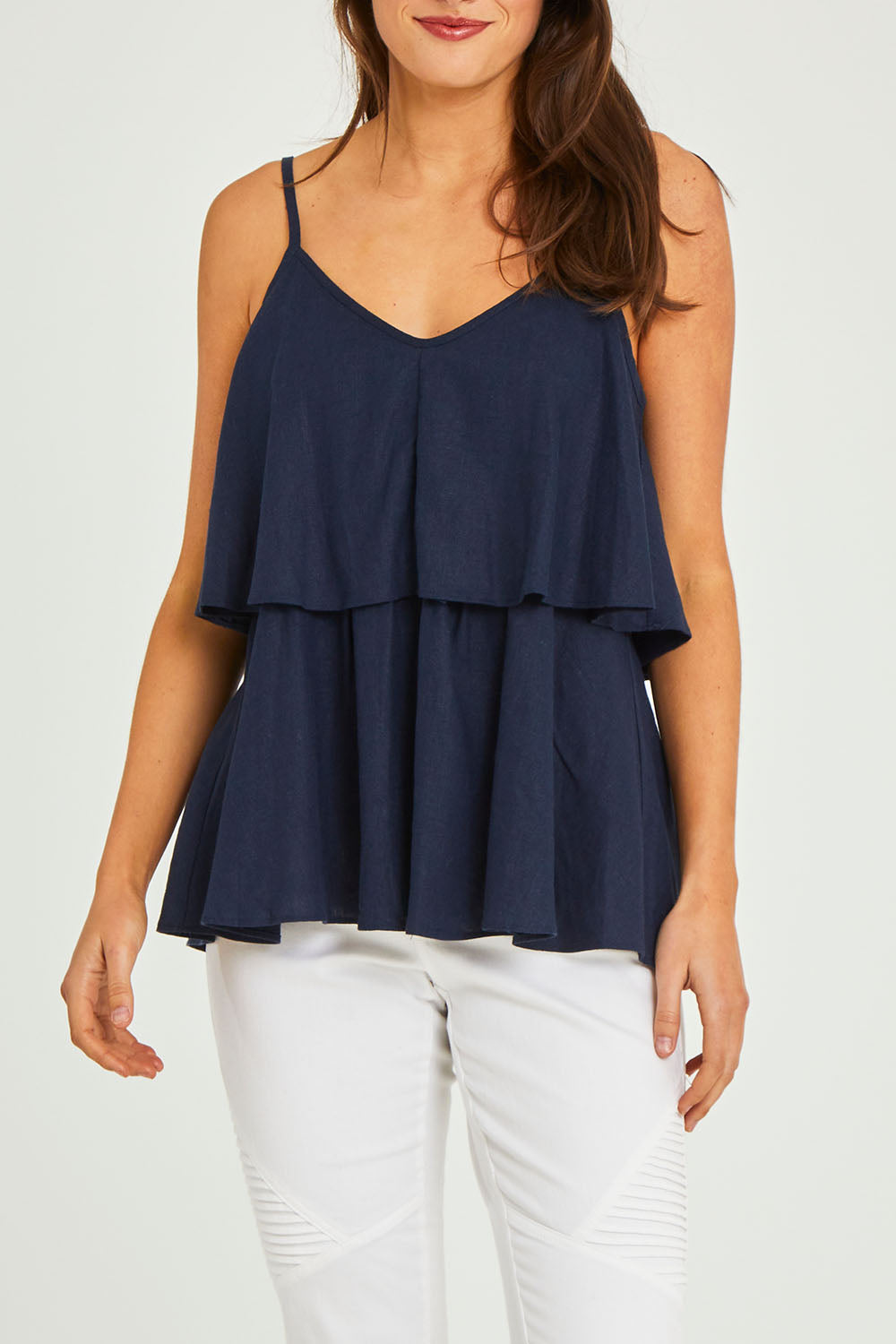 Model Elhana wearing size 10 of the Fifi Cami in colour Nigshadow (Blue), from the front, cropped image