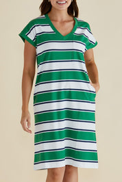 A model wearing the Zena Cotton Tin colourShirt Dress - Green (Green), from the front, cropped image