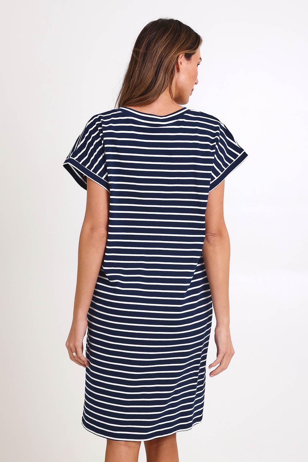 Model Madelinec wearing size 10 of the Zena T-Shirt Dress – Navy in colour Navy, from the back