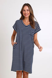 Model Madelinec wearing size 10 of the Zena T-Shirt Dress – Navy in colour Navy, in a cropped view