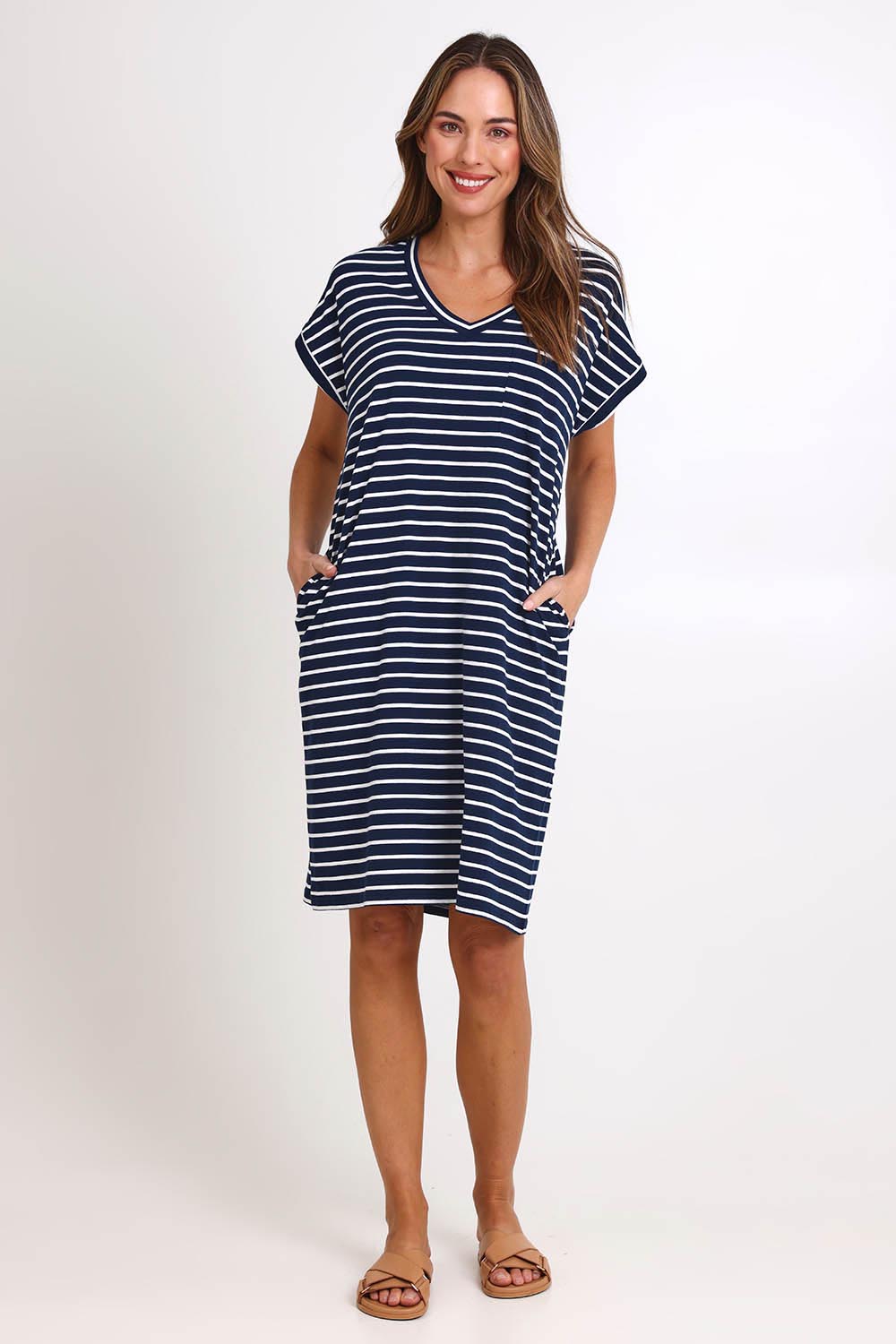 Model Madelinec wearing size 10 of the Zena T-Shirt Dress – Navy in colour Navy, from the front