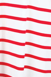 Product shot of the Zena T-Shirt Dress – Red in colour Red, showing detail
