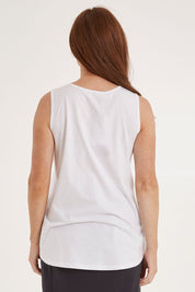 Model Sally wearing size 10 of the Josie Tank in colour White (White), from the back