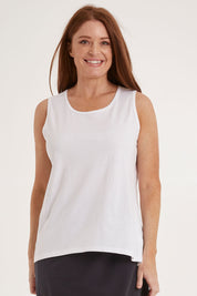 Model Sally wearing size 10 of the Josie Tank in colour White (White), from the front, cropped image